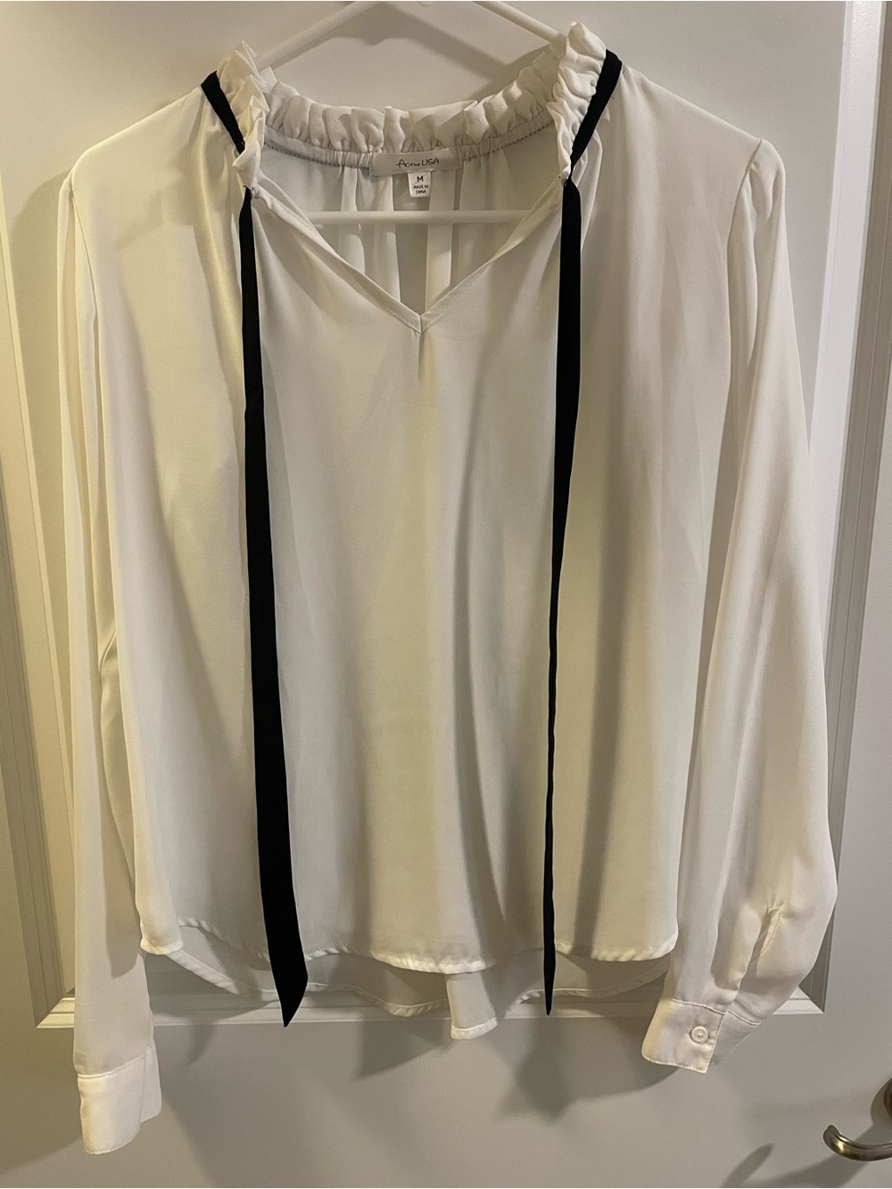Aritzia - White Ruffled Neck Blouse with Black Ribbon Ties